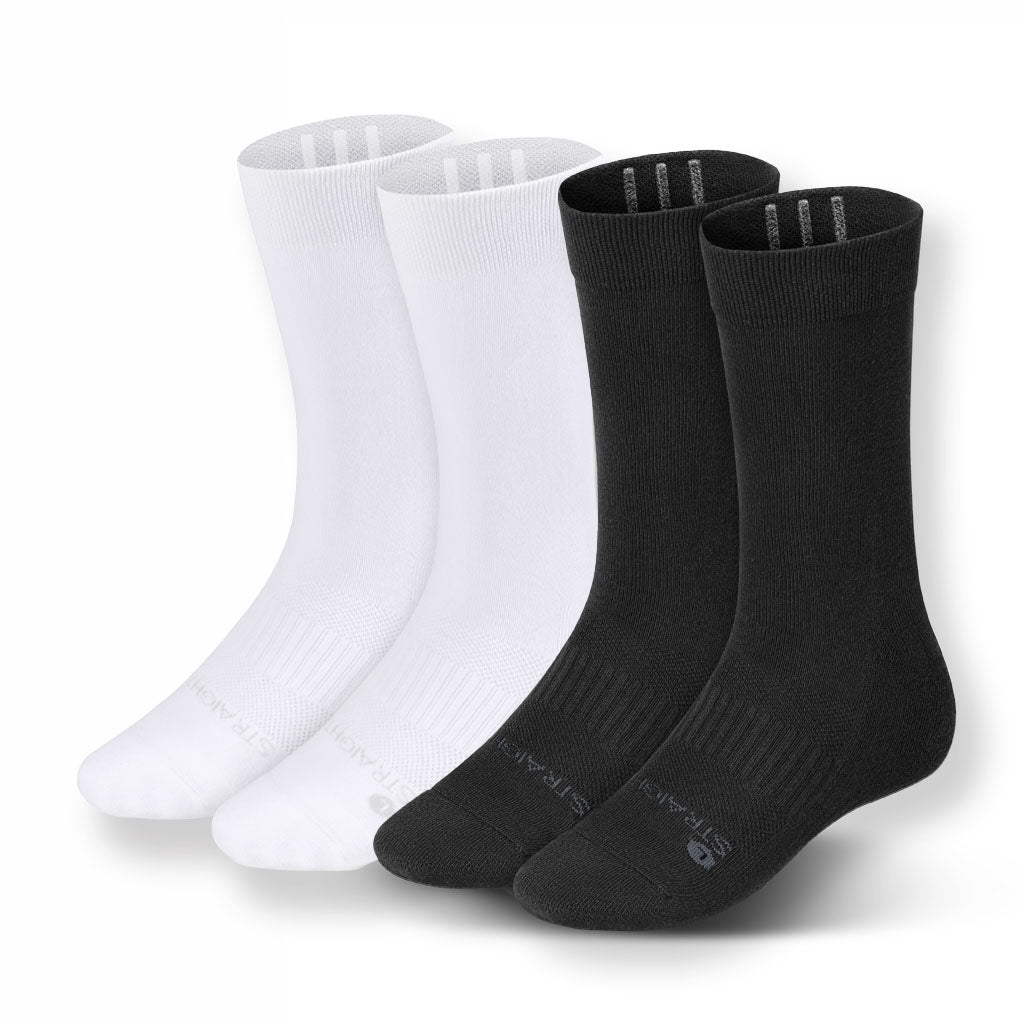Two pairs of black and white socks on a white background